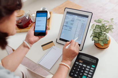 Woman banking on her laptop