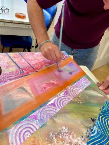 A service user painting 