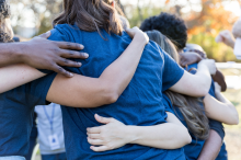 Volunteers hugging